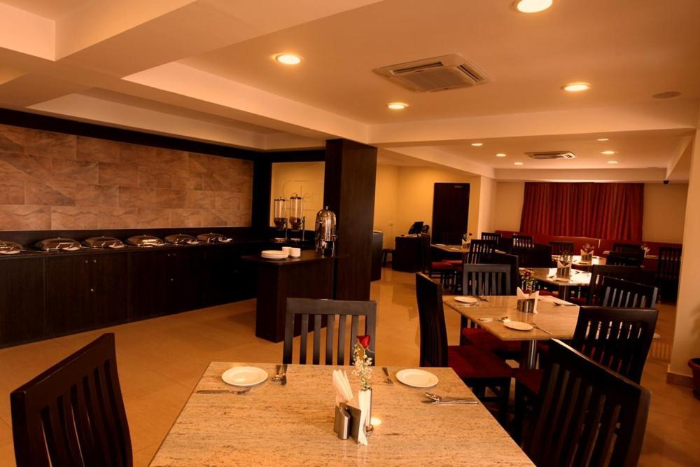 Hotel Nagarjuna Suites Bangalore Restaurant bilde